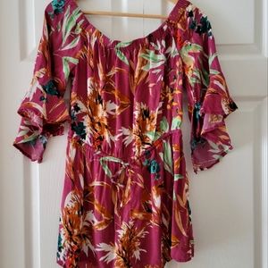 Express floral romper in size Medium